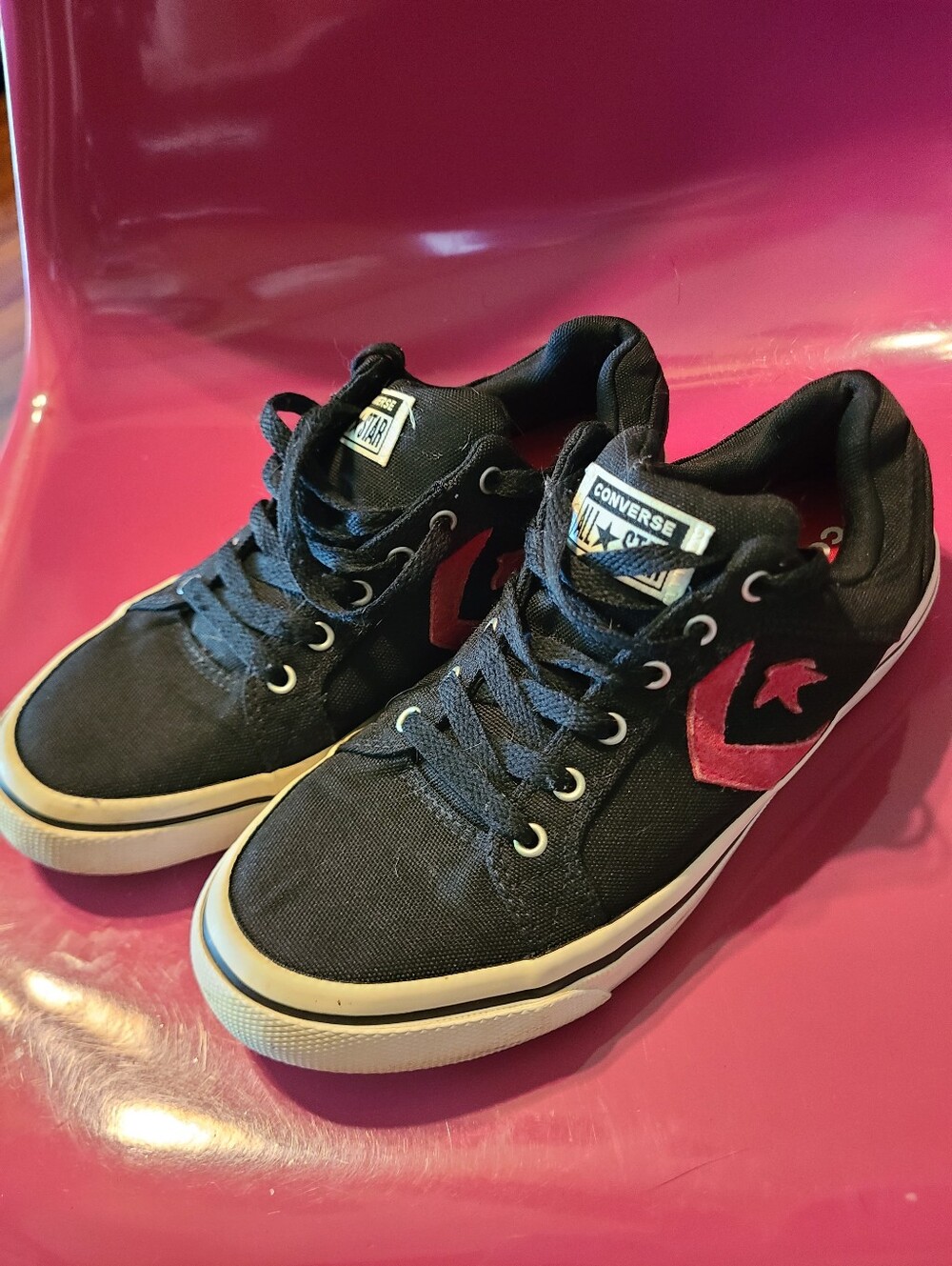 Converse Women's Black Canvas Sneakers with Pink Star Accent